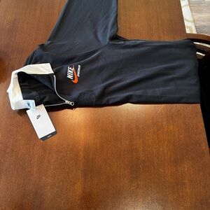 Never worn Nike Rugby shirt.